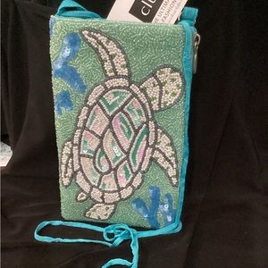 Bamboo trading company cell phone crossbody open top